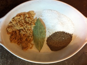 Clockwise from top: kosher Salt; ground Black Pepper; Bay Leaf; Brown Sugar.