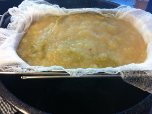 Making pectin: Straining the cooked apples