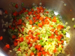 Sauteing the vegetables and garlic.