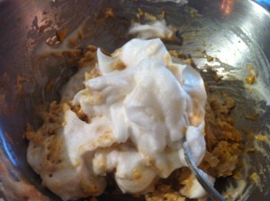 Folding in the egg whites.