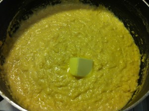 Stirring in the butter.
