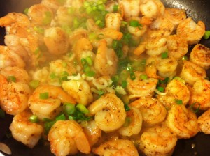 Adding the scallions.