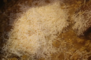 Adding the butter and parmesan.