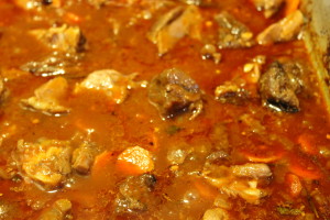 The meat back in the sauce. You can do this if you want to help stretch the meat. I like to do it when I use fore shanks.