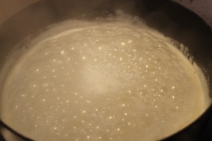 Parboiling the rice. Be sure to stir occasionally to be sure it doesn't stick to the bottom of the pot.